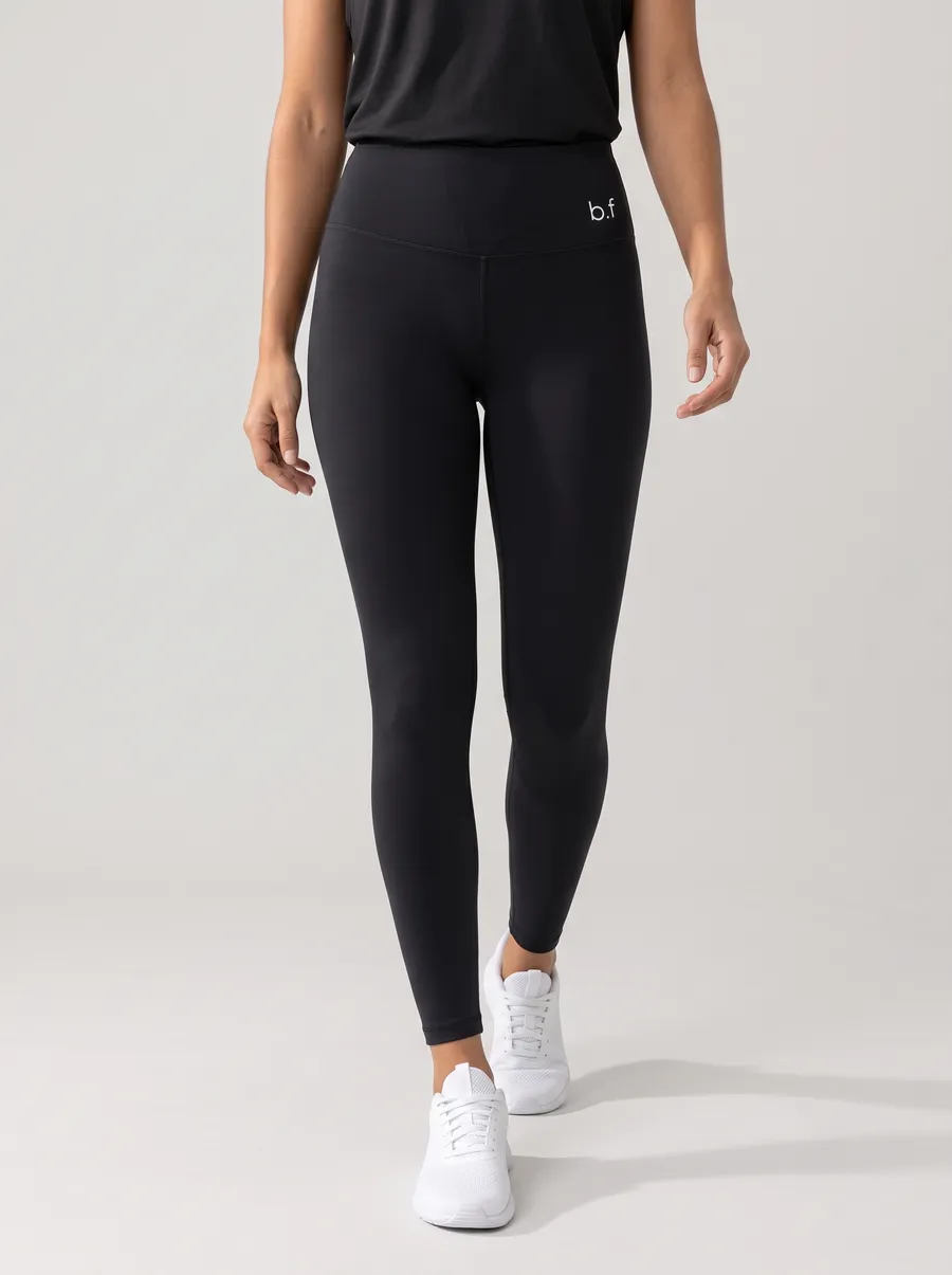 Legging preta de cós alto com logo b.f, de frente